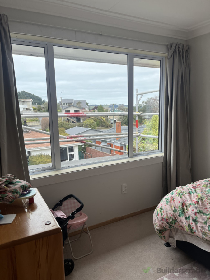 New aluminium window in kids bedroom with architraves installed