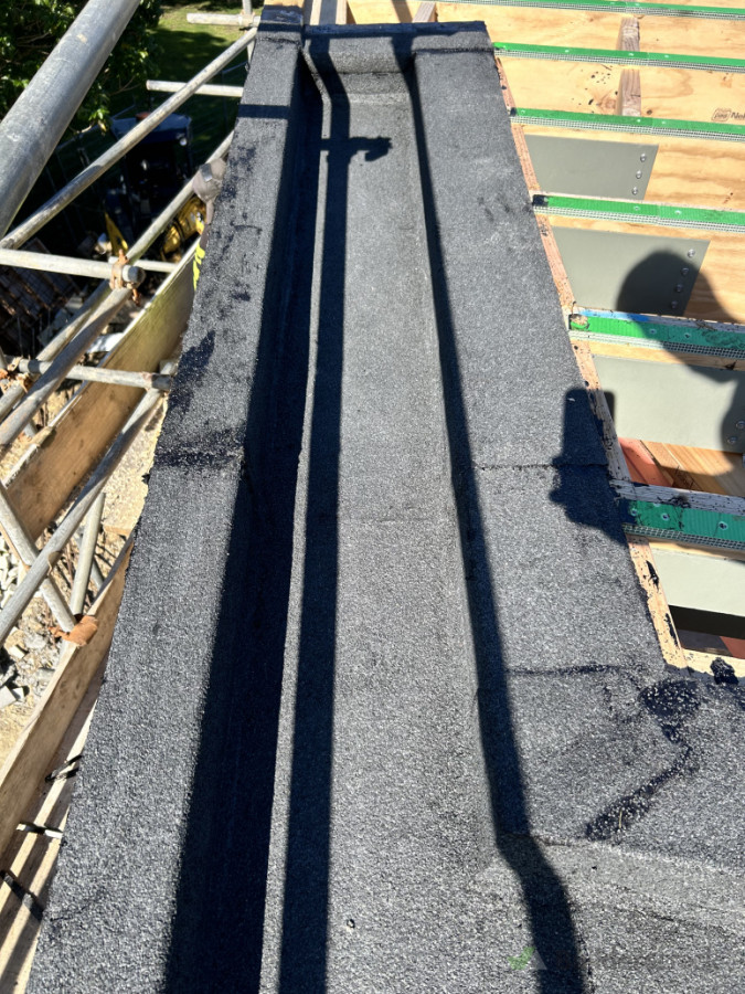 Torch on membrane gutter