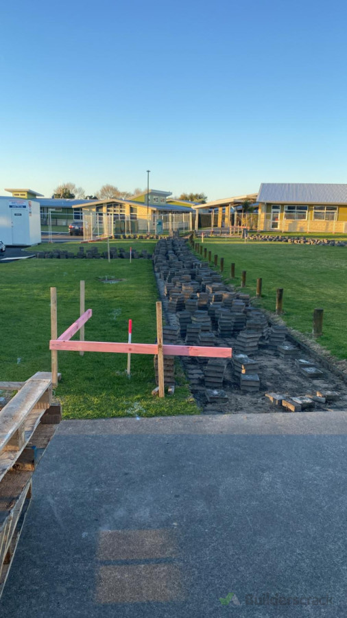 lift 400m2 pavers for new schoolyard construction project.