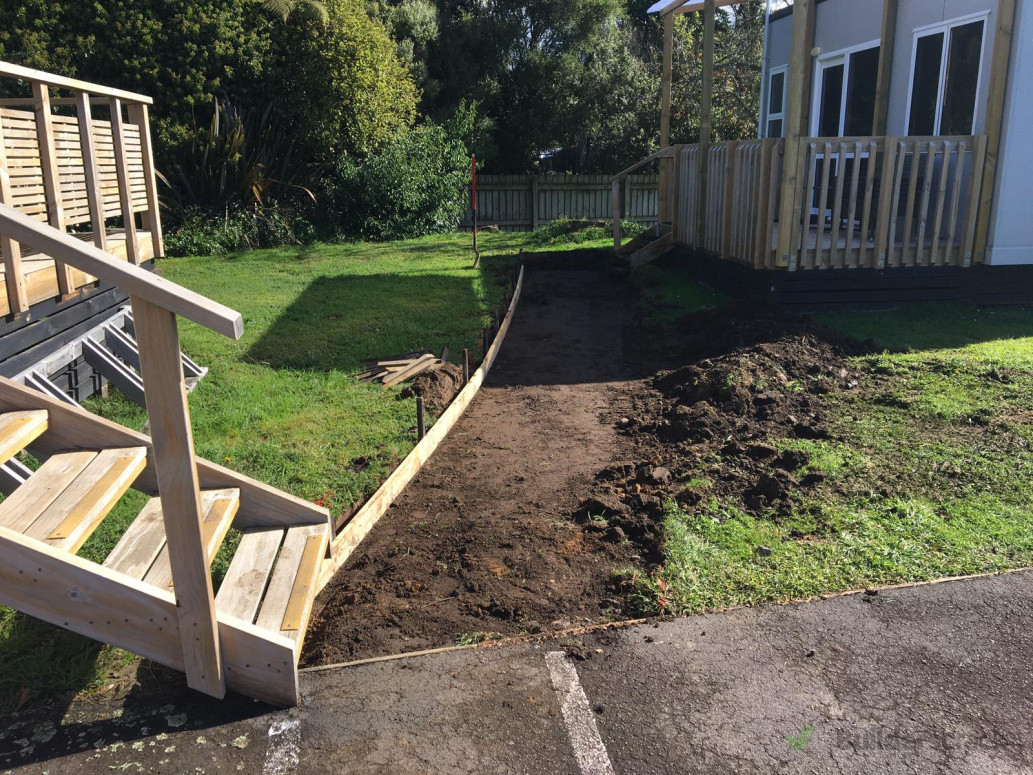 excavate material in preparation for new pathways