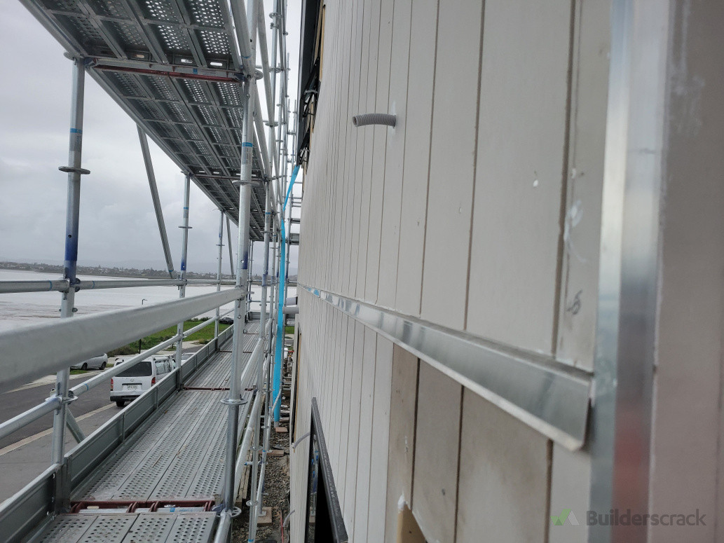 Vertical panel exterior wall