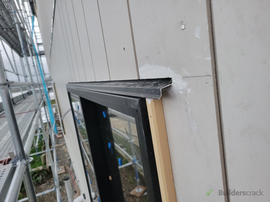 Vertical panel exterior wall