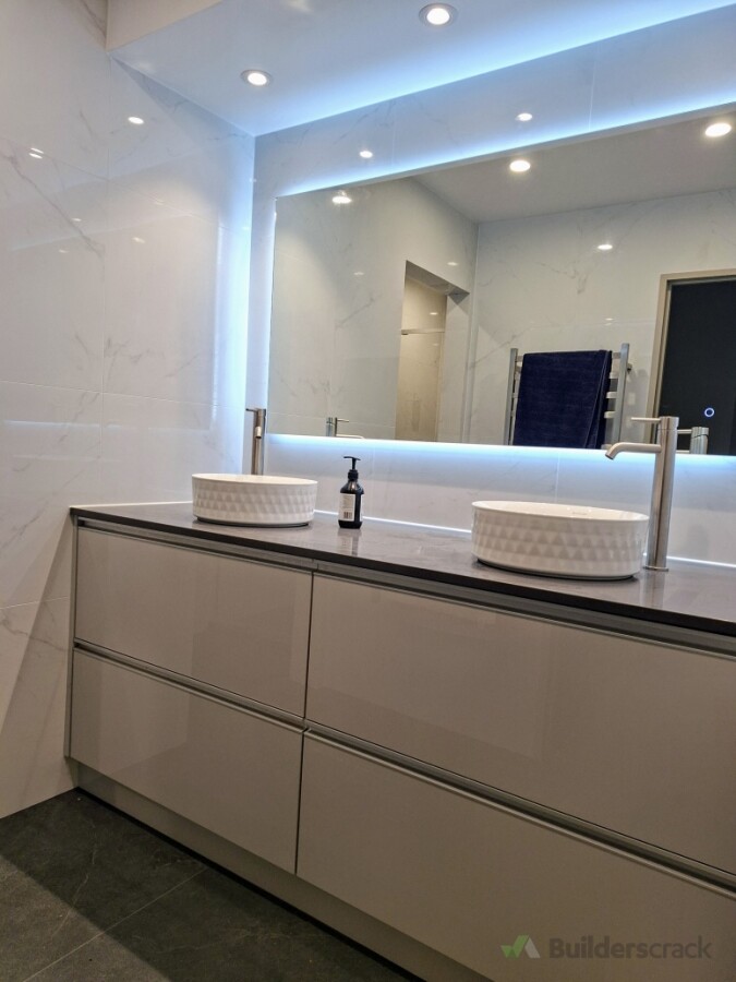 Full bathroom renovation in Whangarei. Water damage repaired and all wall gib replaced. Full height tiling, custom vanity and very happy customers 😀