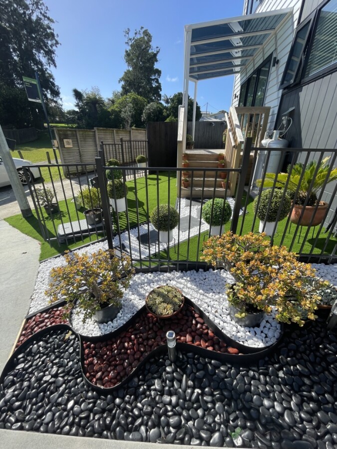 Artificial Grass and pebbles