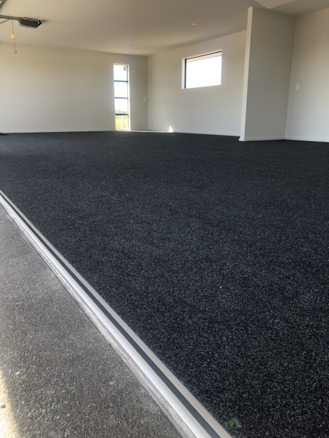 Garage carpet with 50mm brushed alloy bar finish