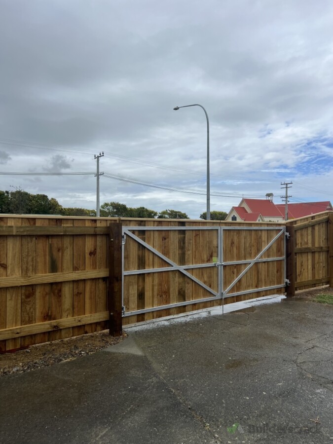 New timber boundary fence and in house custom built galvanised driveway gate installation.