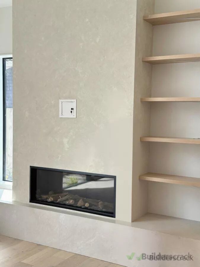 Fireplace feature wall finished with careful cutting-in and clean presentation.