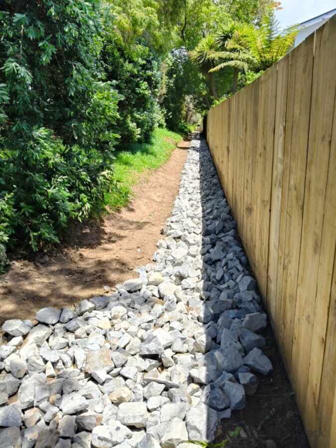 Rock Lined Swale Drain for Arahoe School