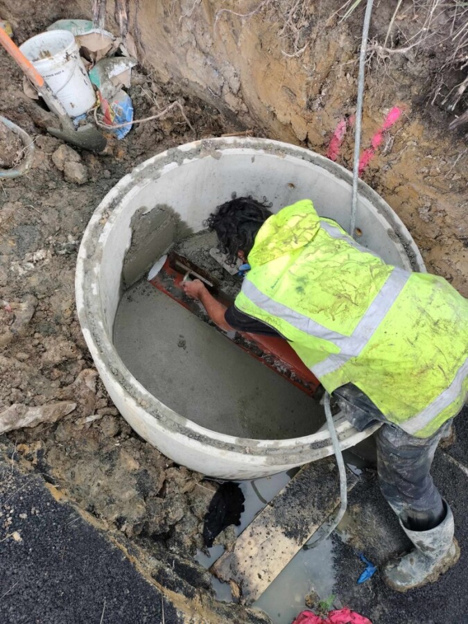 Benching the New Manhole