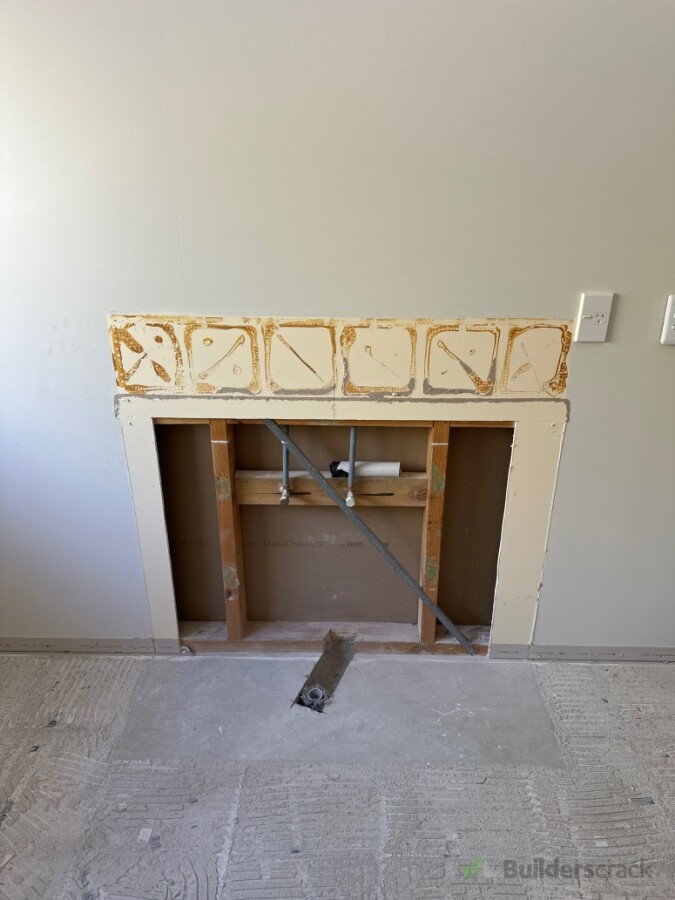 Cut gib where needed and alter pipes