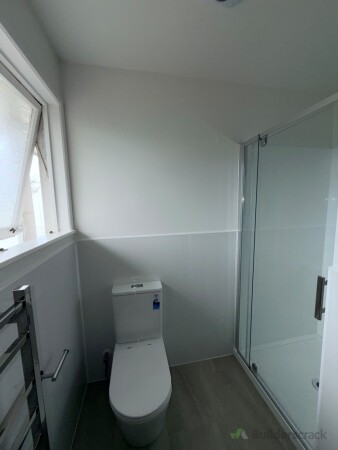 New toilet with the specialised wet wall around the whole room