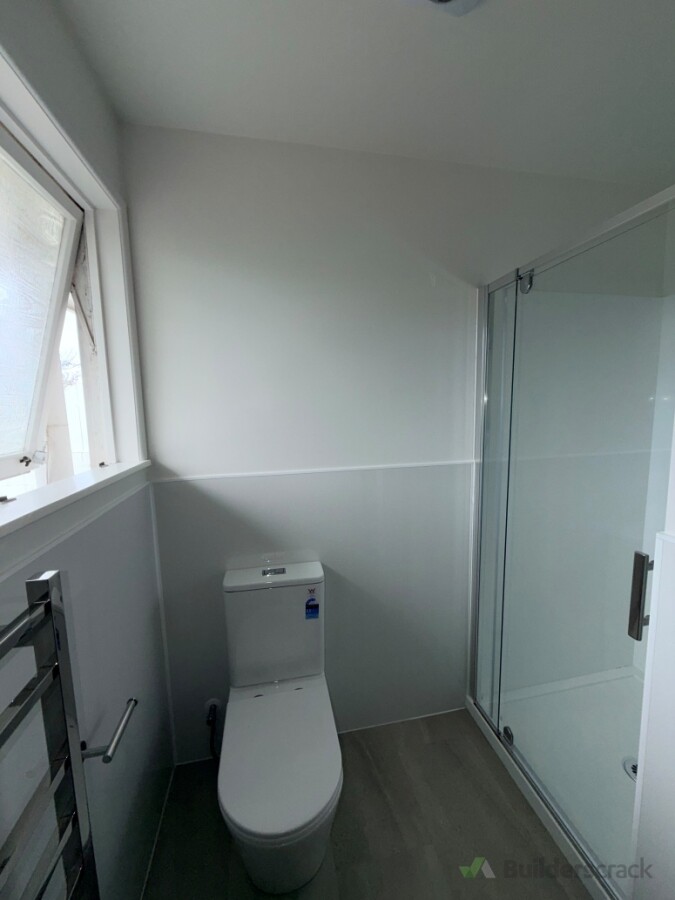 New toilet with the specialised wet wall around the whole room