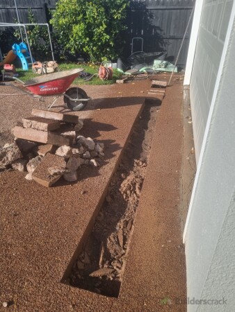 Concrete cut and broken out.