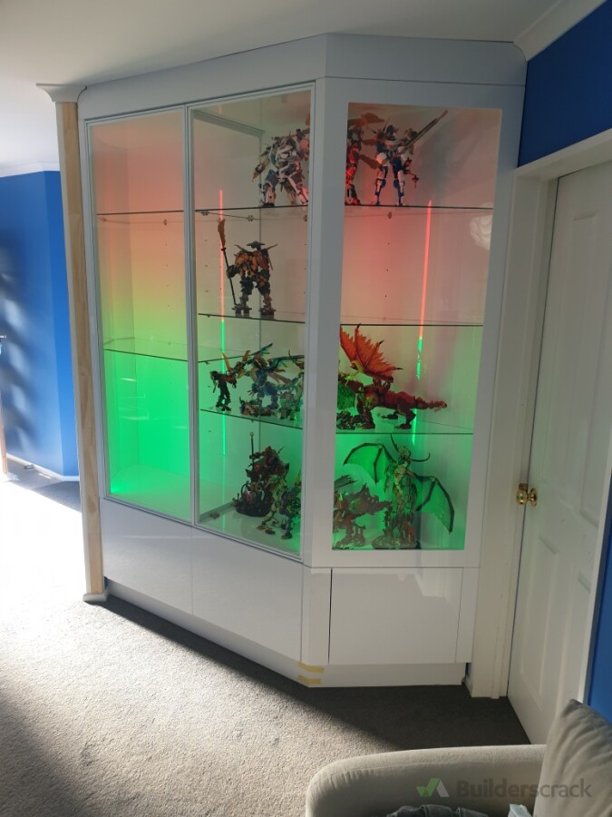 Custom  Designed and constructed  cabinet to fit into an odd shaped corner