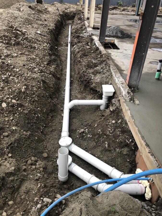 Sewer with rodding point at top of drain