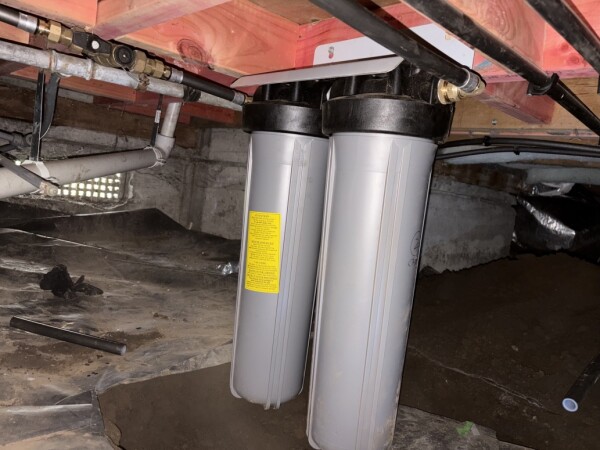 Installed under the house.