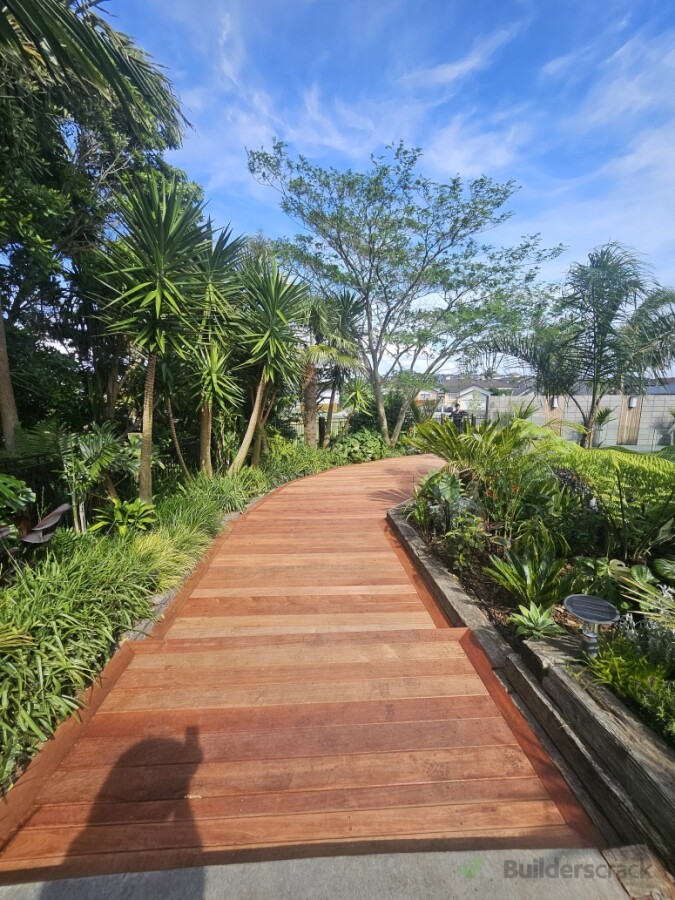 Beautiful timber boardwalk designed and built to complement the existing garden and create an easy, natural pathway through the landscape.