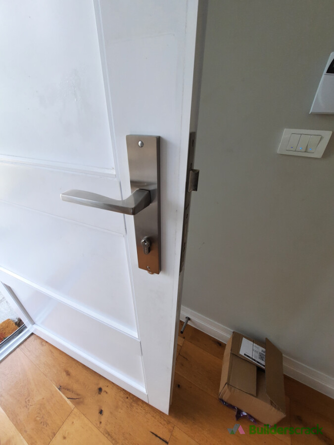 Replaced failed digital lock with new key and handle for rental property