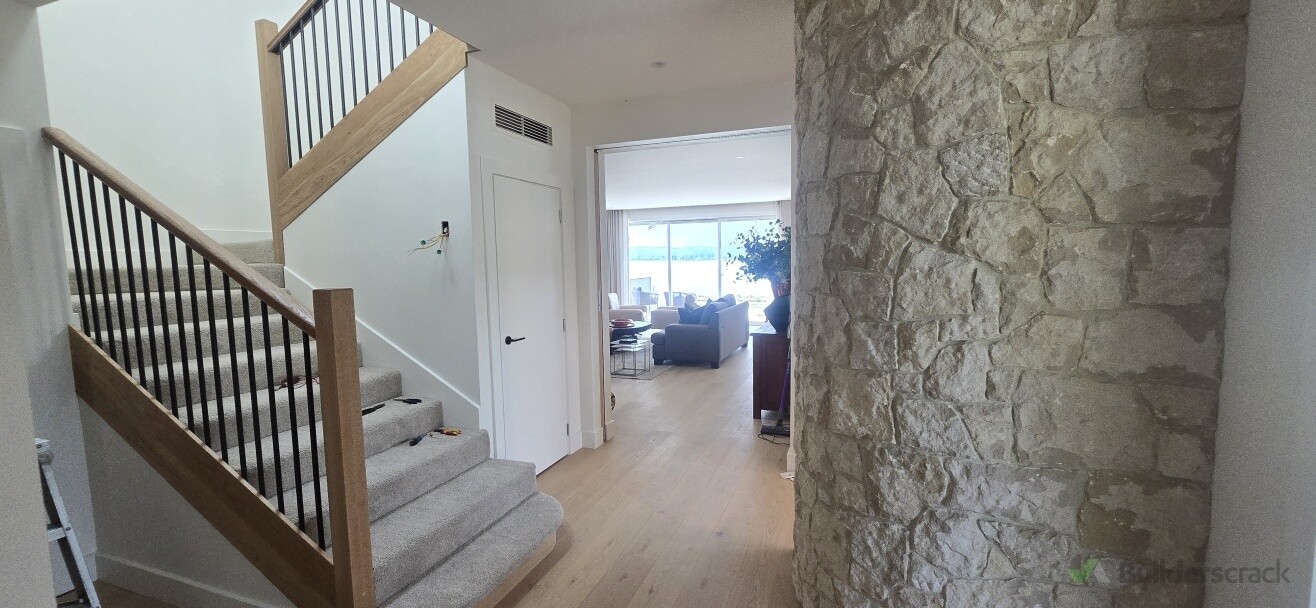 Curved Lime stone wall as part of a Full house renovation