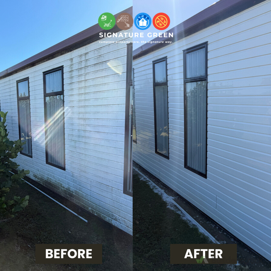 Commercial building  wash removing built up dirt and grime