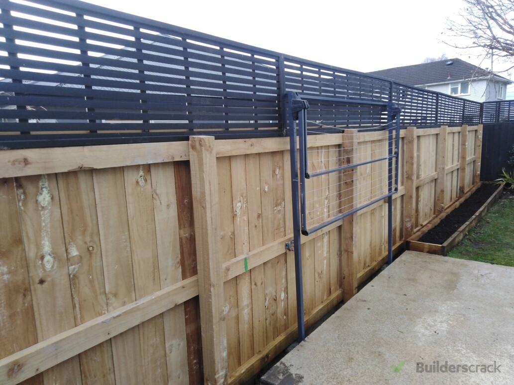 We built the Fence with privacy topper, washingline planterboxes and concrete footpath and padpad