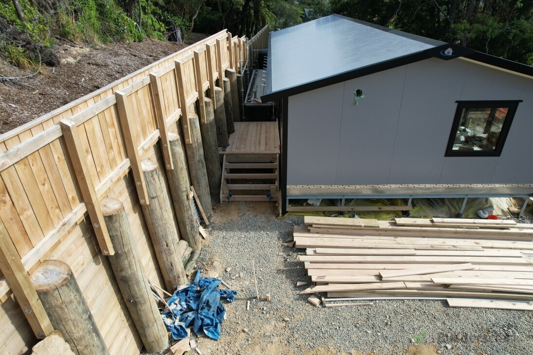 Fencing atop 2m retaining wall
