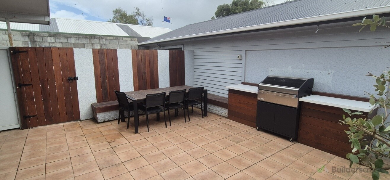 Patio area upgrade, Kwila decking used for gates bench seat and BBQ Bench with custom made 45mm concrete benchtops