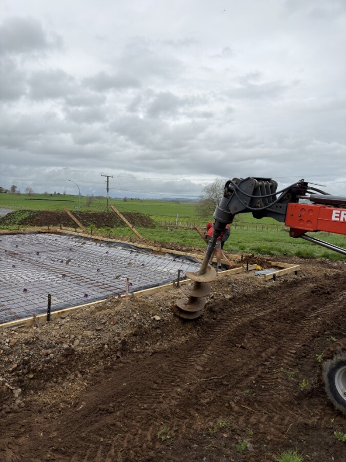 Augering footings