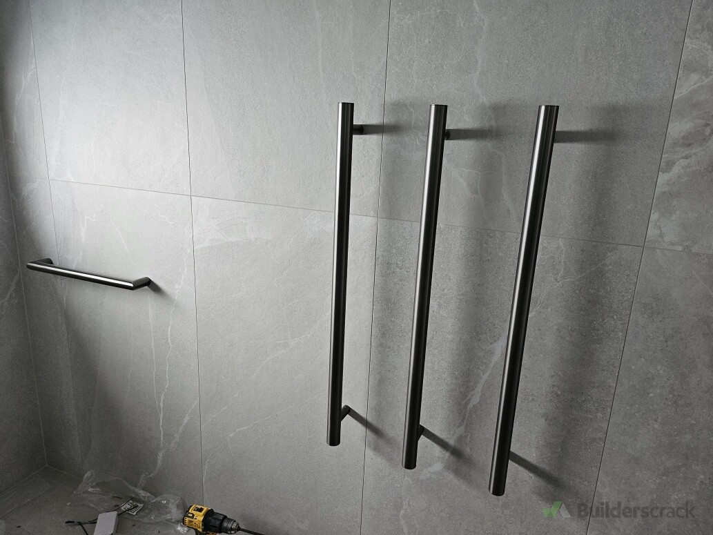 Installed modern heating towel rail