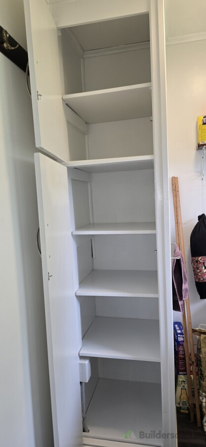 Cylinder space converted to pantry.
