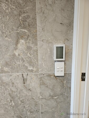 Modern light switches and underfloor heating controller