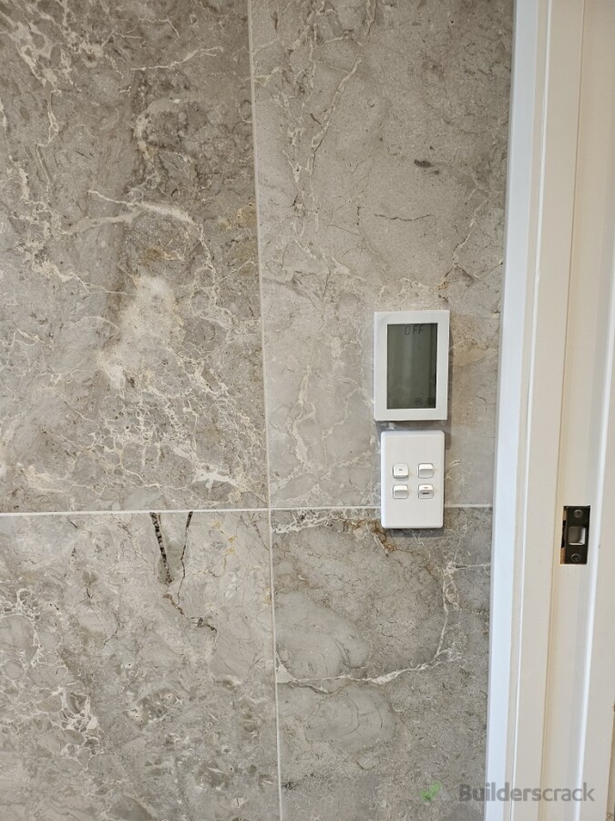 Modern light switches and underfloor heating controller