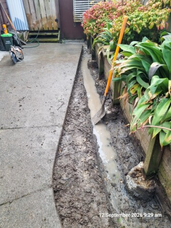 Trench is dug-out, already catching a lot of water!