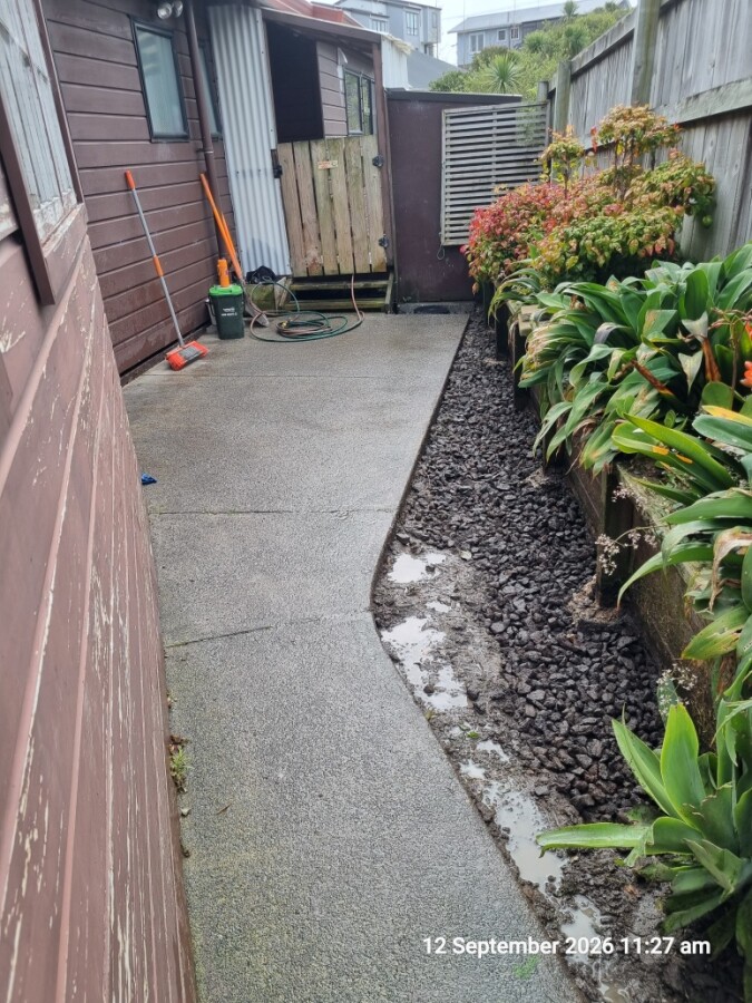 Trenches filled with scoria and site cleaned up.