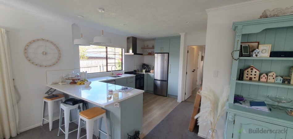 Previously a seperate kitchen, removed walls to create open plan layout, all new cabinetry + stone benchtops, flooring, plumbing, electrical, tiled splashback