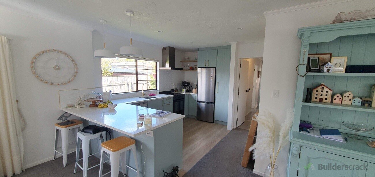 Previously a seperate kitchen, removed walls to create open plan layout, all new cabinetry + stone benchtops, flooring, plumbing, electrical, tiled splashback