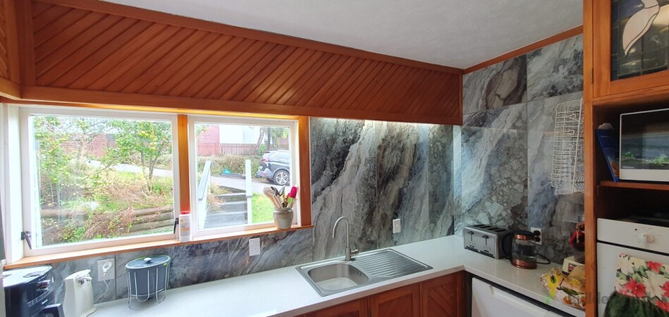 New bench tops/plumbing + feature tiled walls