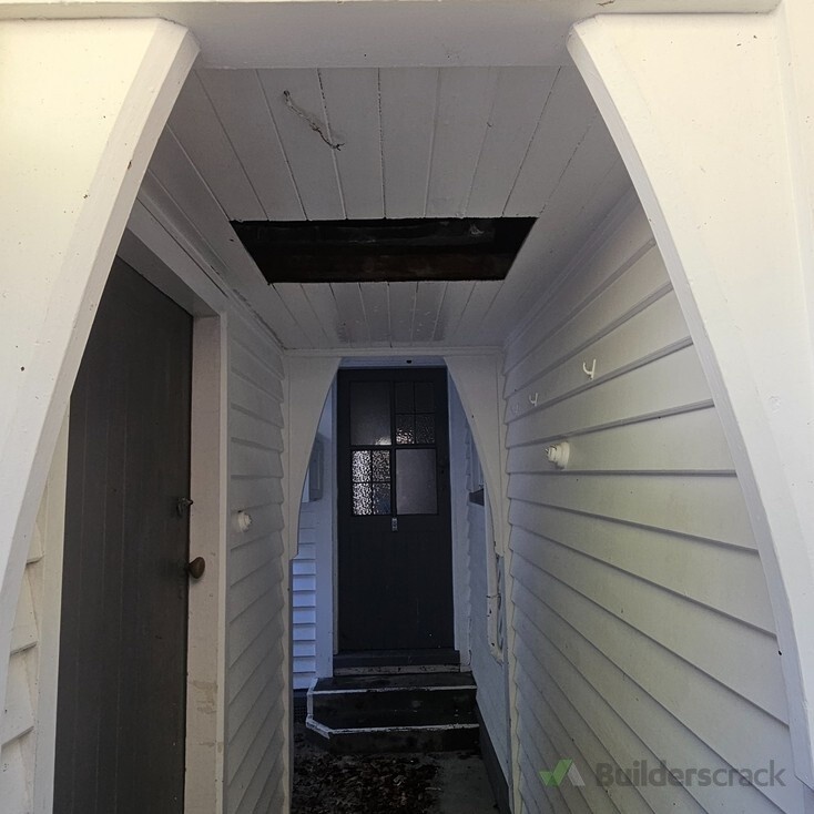 Entrance weatherboards and soffits cleaned.