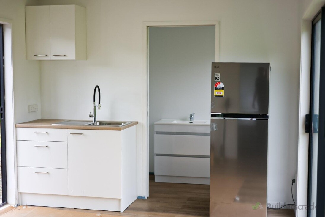 Kitchenette and bathroom, vinyl plank flooring in the cabin