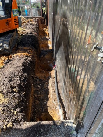 Pile holes all drilled and ready for its new concrete posts and to be set in concrete