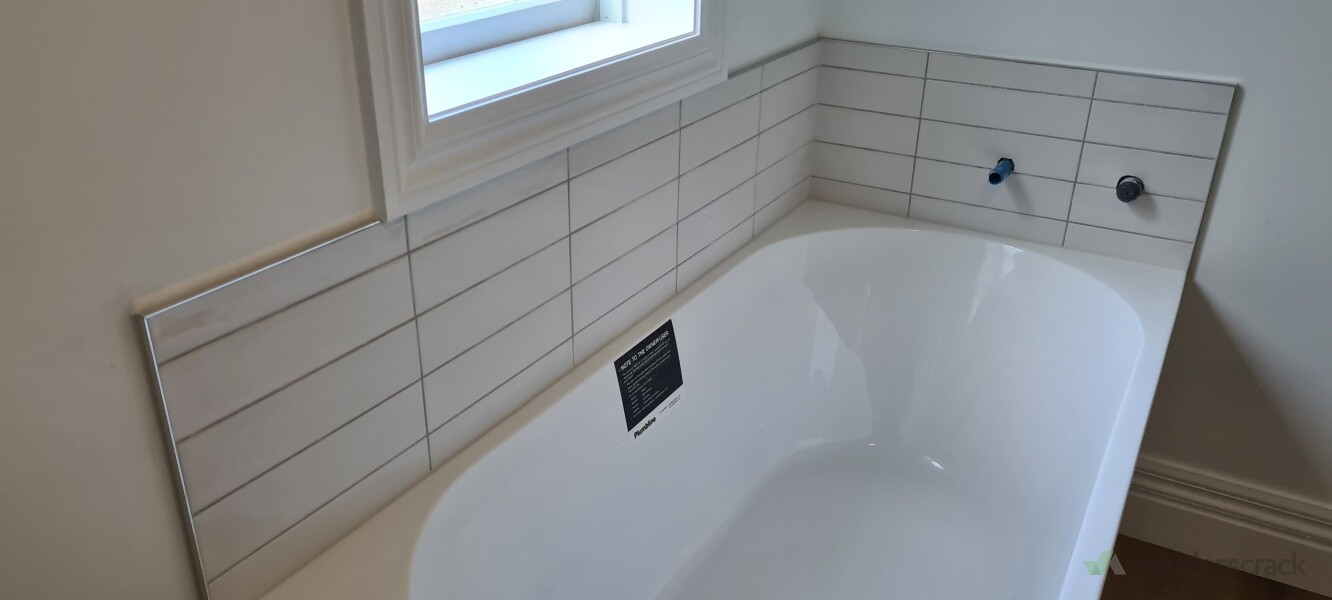 Bath pipe work waiting for fit off post waterproofing