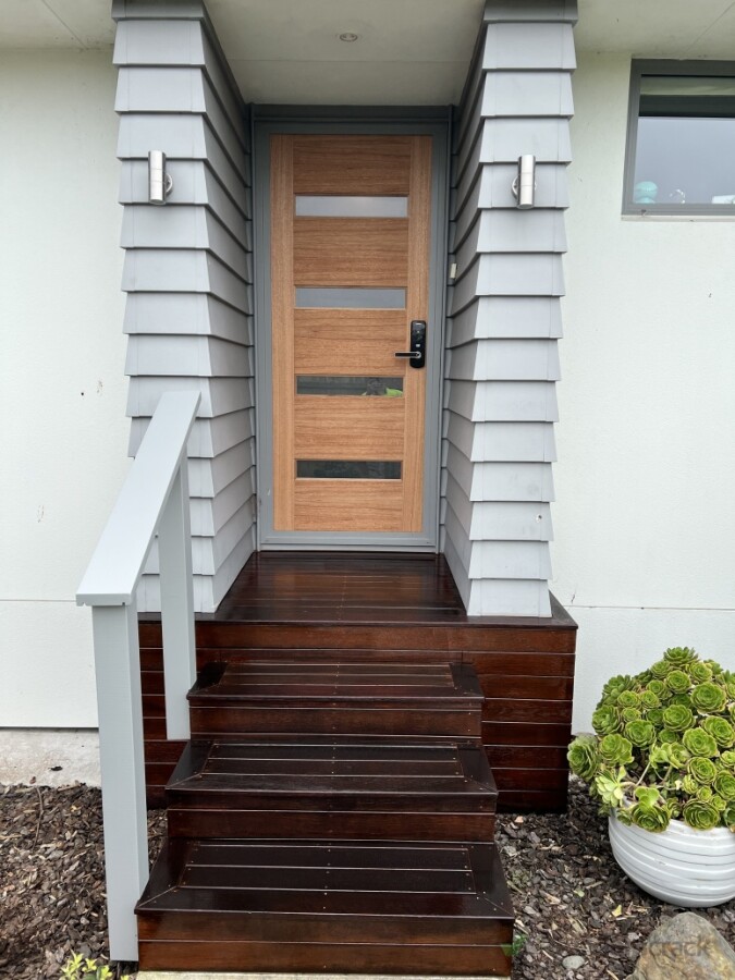 Staining and oiling deck/door and colour matching hand rail to wall