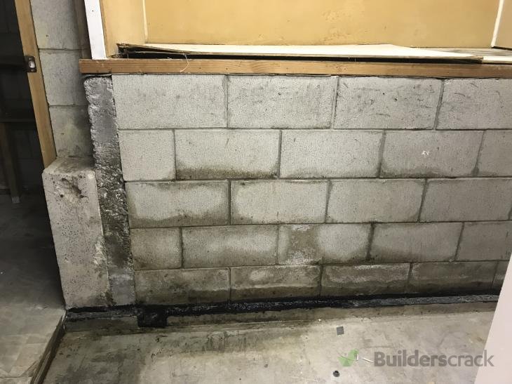 Leaking garage wall ( 285230) Builderscrack