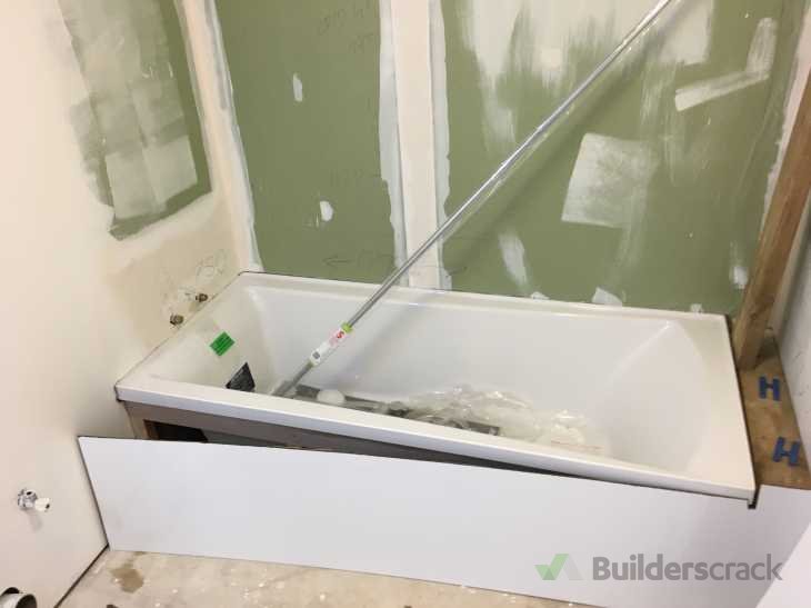 Fit shower over bath wall lining and taps Fit toilet Connect laundry tub ( 311534
