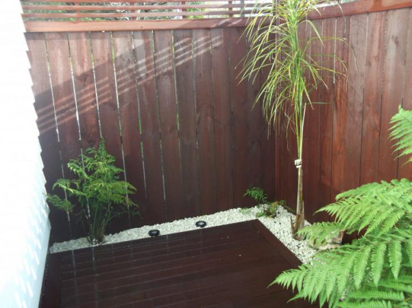 Spa area plantings/ Ferns/  Weed Mat /White pebbles