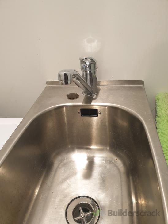 Install a new tap in the laundry ( 355078) Builderscrack