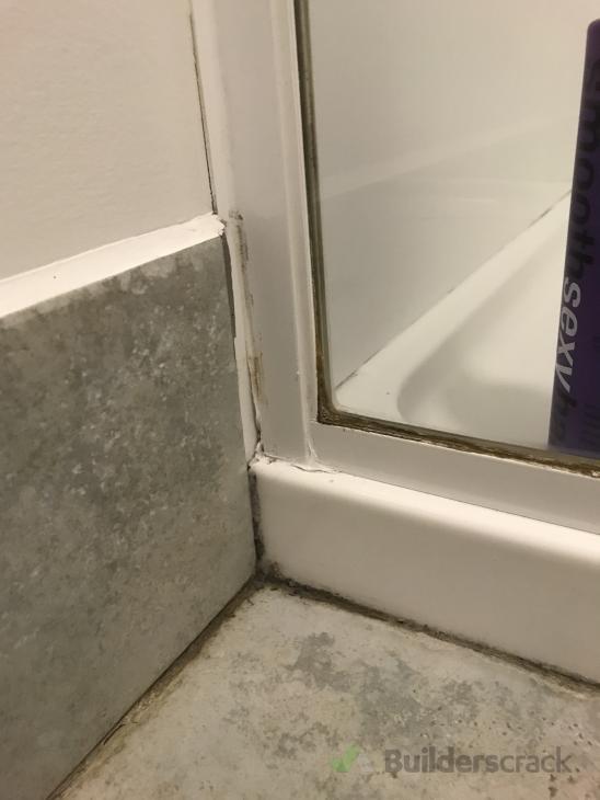Re seal shower & realign shower door ( 358607) Builderscrack