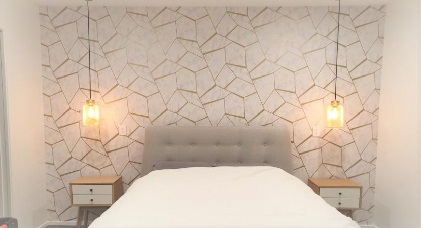 Wallpapering in Grenada Village