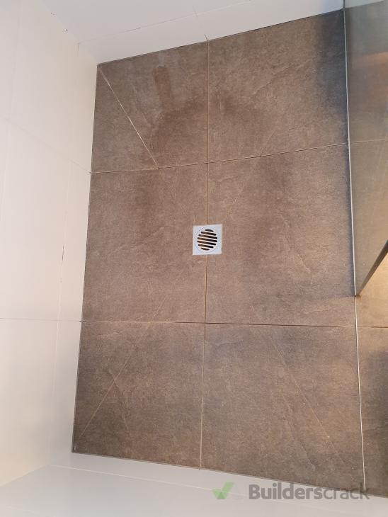 Shower renewal regrout, clean, caulking ( 402077) Builderscrack