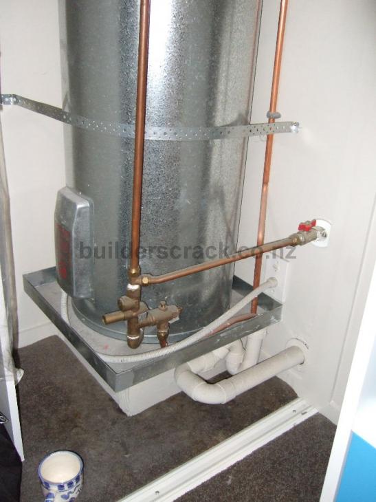 Leaking Hot Water Cylinder Leak / Overflow (# 13031) | Builderscrack